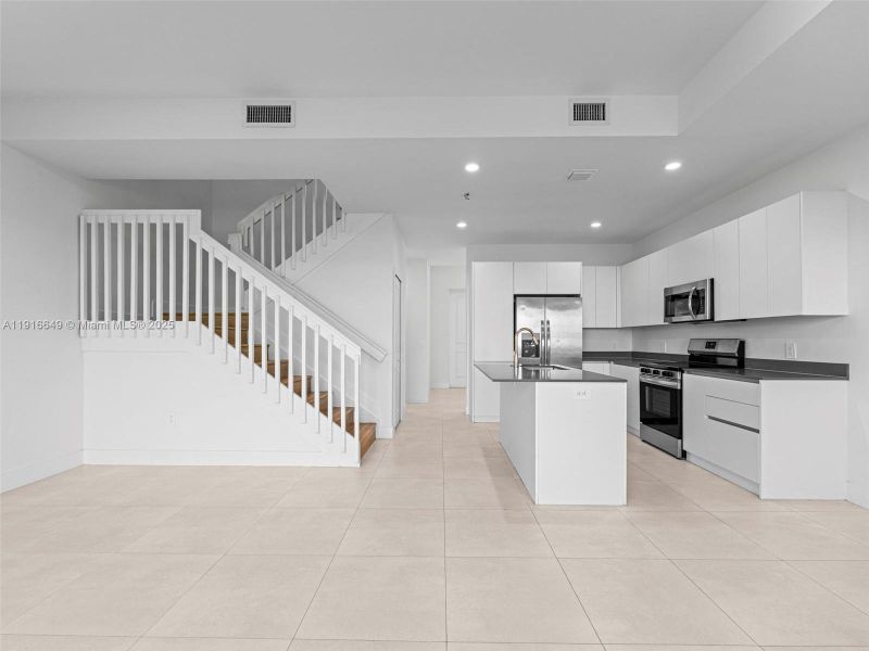 Furnished interior view inside a new home in , Homestead (Image 12). Furnished interior view inside a new home in , Homestead (Image 12).