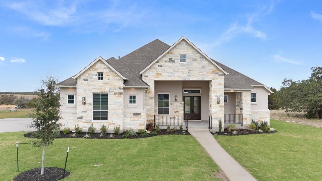 Front exterior of a new home in Feathergrass, Florence, TX, highlighting curb appeal (Image 30).