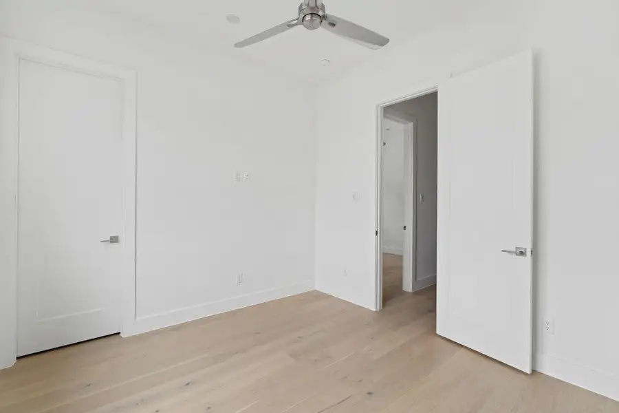 This secondary bedroom features LED lighting and 7 ½” Plank European White Oak floors. This secondary bedroom features LED lighting and 7 ½” Plank European White Oak floors.