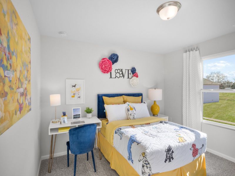 Secondary bedroom in the Brentwood floorplan at a Meritage Homes community in Graham, NC.