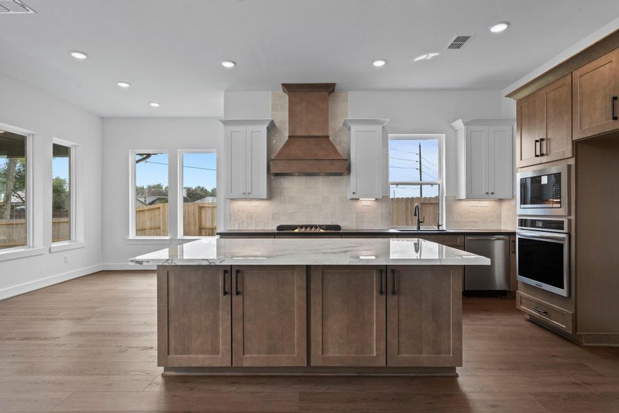 Furnished interior view inside a new home in Sienna Village of Anderson Springs 50', Missouri City (Image 7).