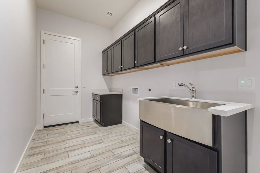 Furnished interior view inside a new home in Valencia at Granite Vista, Waddell (Image 13).