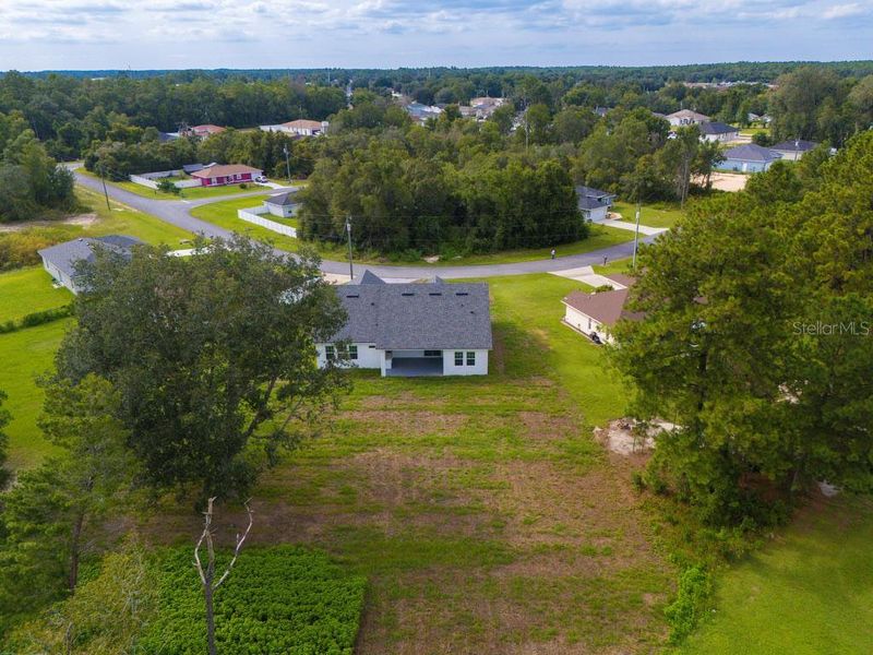Front exterior of a new home in , Ocala, FL, highlighting curb appeal (Image 2).