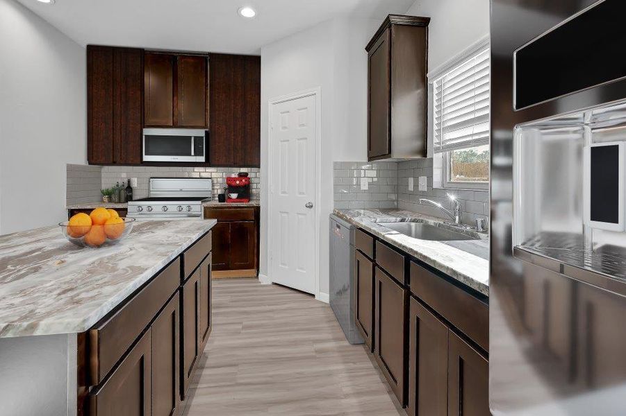 Furnished interior view inside a new home in Enclave at Willis, Willis (Image 5).