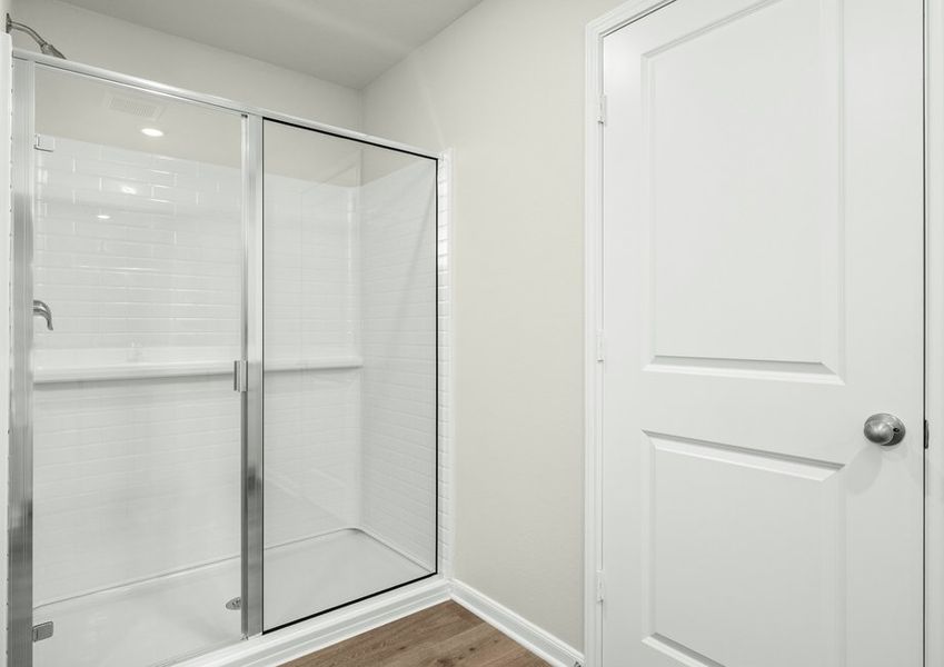 The master bathroom has a large glass, walk-in shower. The master bathroom has a large glass, walk-in shower.