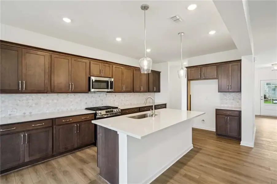 Furnished interior view inside a new home in Eastlyn Crossing, Flowery Branch (Image 6). Furnished interior view inside a new home in Eastlyn Crossing, Flowery Branch (Image 6).