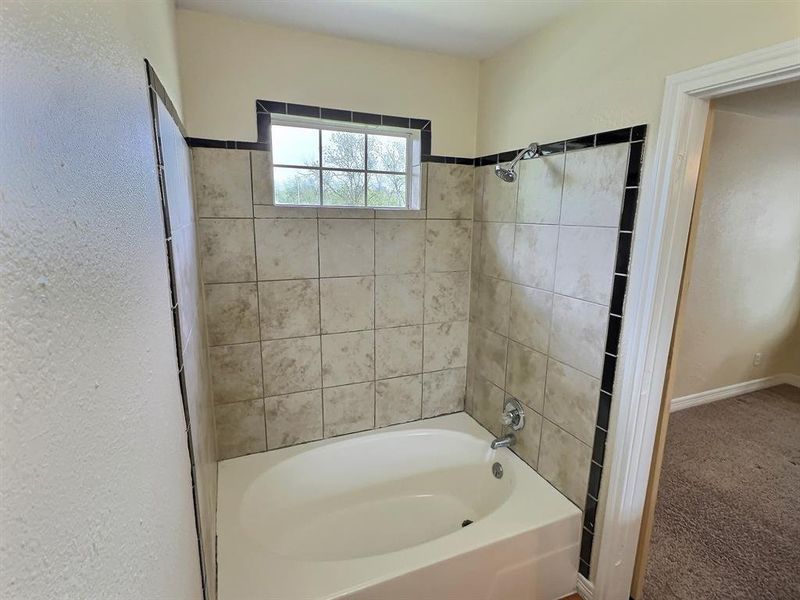 Full bathroom with  shower combination