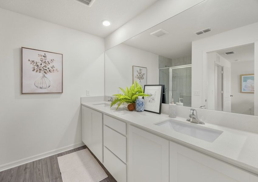 The master bath has a stunning dual sink vanity!