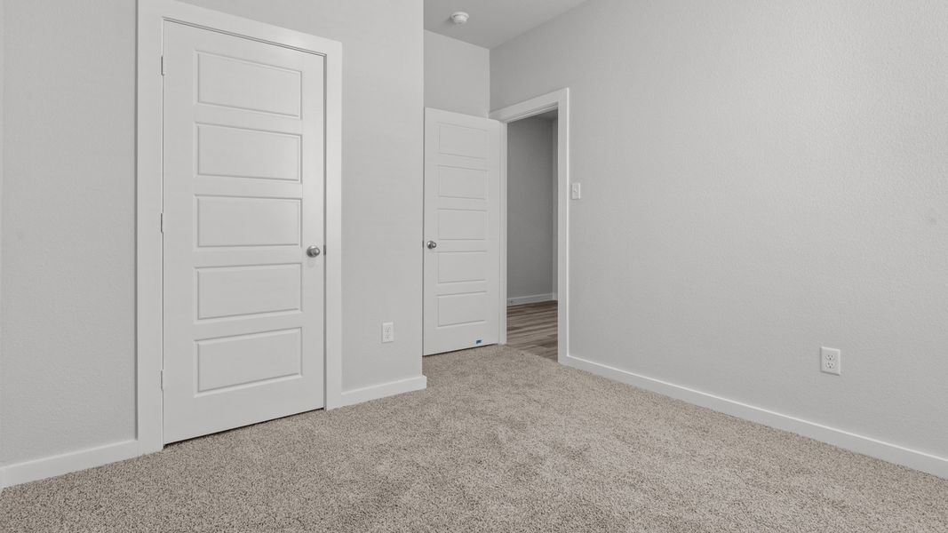 Representative unfurnished interior of a home built from the LAKE FORT by D.R. Horton in Heritage Parks, Abilene (Image 27).