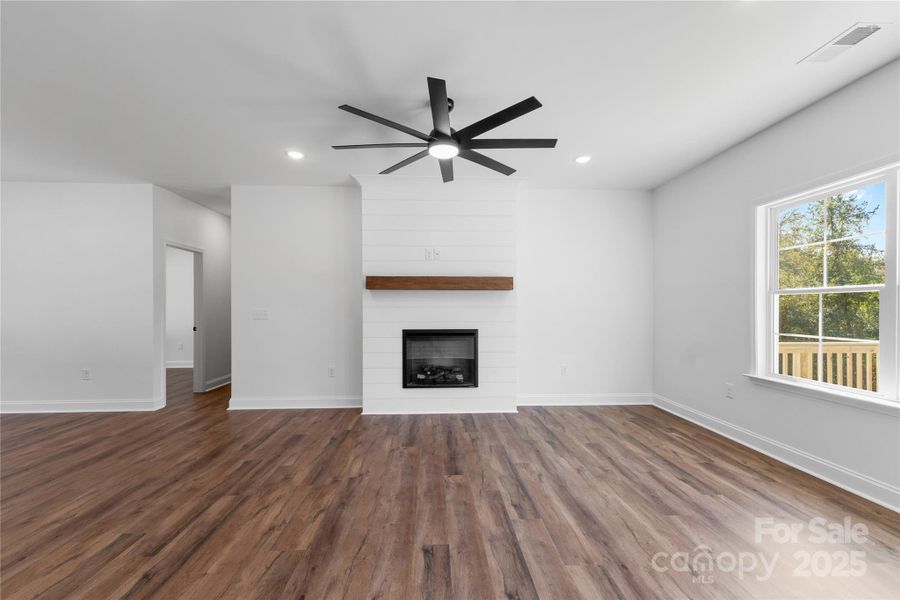 living room w/ electric shiplap fireplace living room w/ electric shiplap fireplace