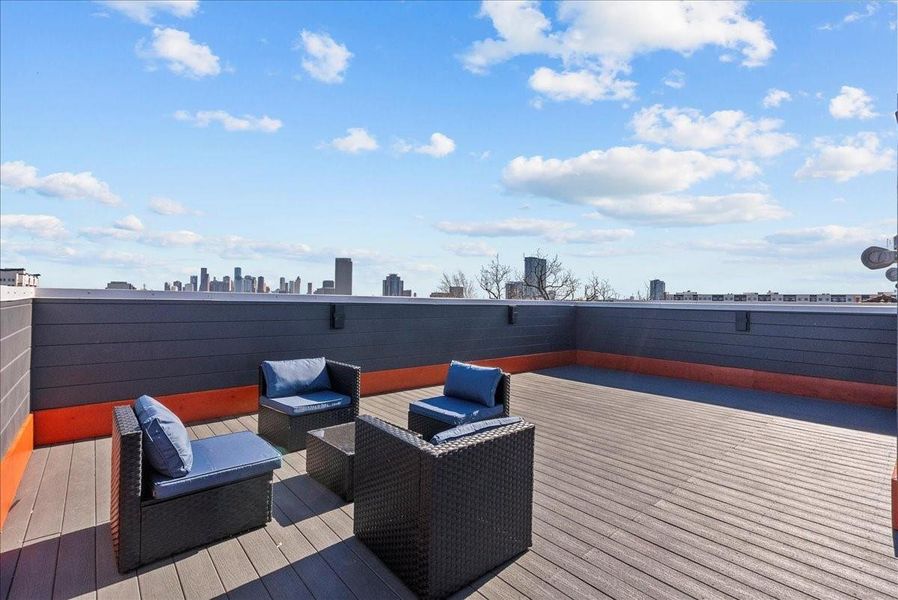 The oversized rooftop deck overlooks the city skyline, offering breathtaking views — it truly doesn’t get better than this.
