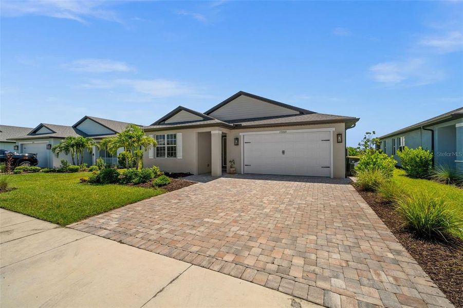 Front exterior of a new home in , Punta Gorda, FL, highlighting curb appeal (Image 27).