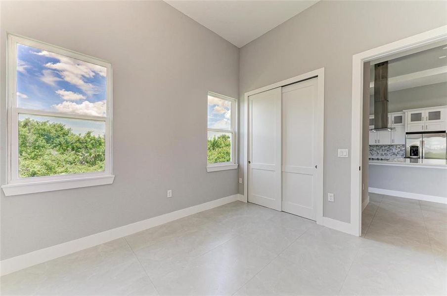 Spacious, unfurnished interior of a new home in , Port Charlotte (Image 37).