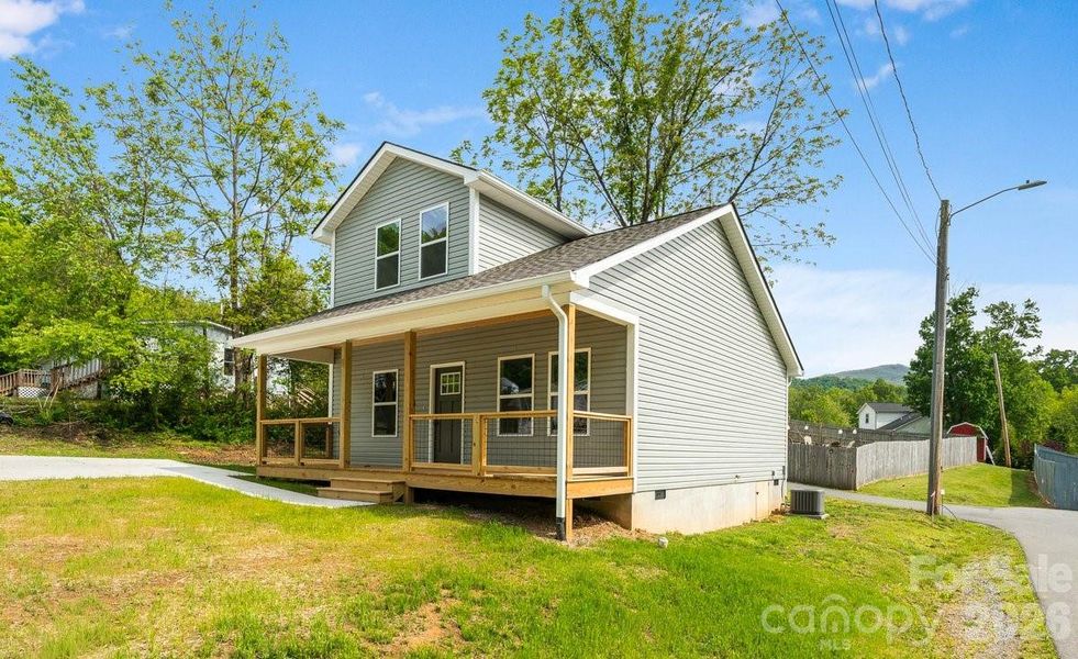 Exterior details and patio area of a home in , Waynesville (Image 14).