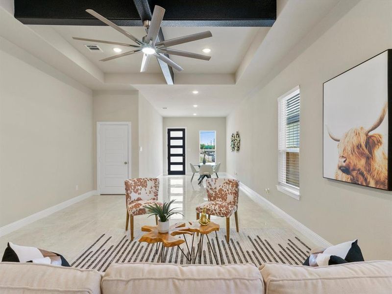 Living room featuring ceiling fan