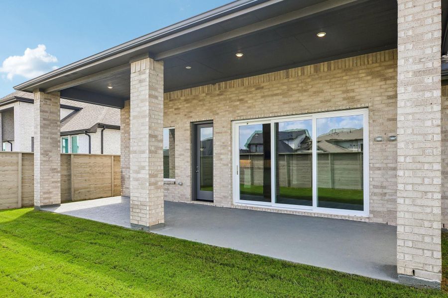 Exterior details and patio area of a home in Legacy, Friendswood (Image 20).