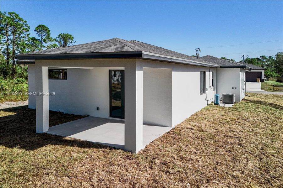 Exterior details and patio area of a home in , Lehigh Acres (Image 19). Exterior details and patio area of a home in , Lehigh Acres (Image 19).