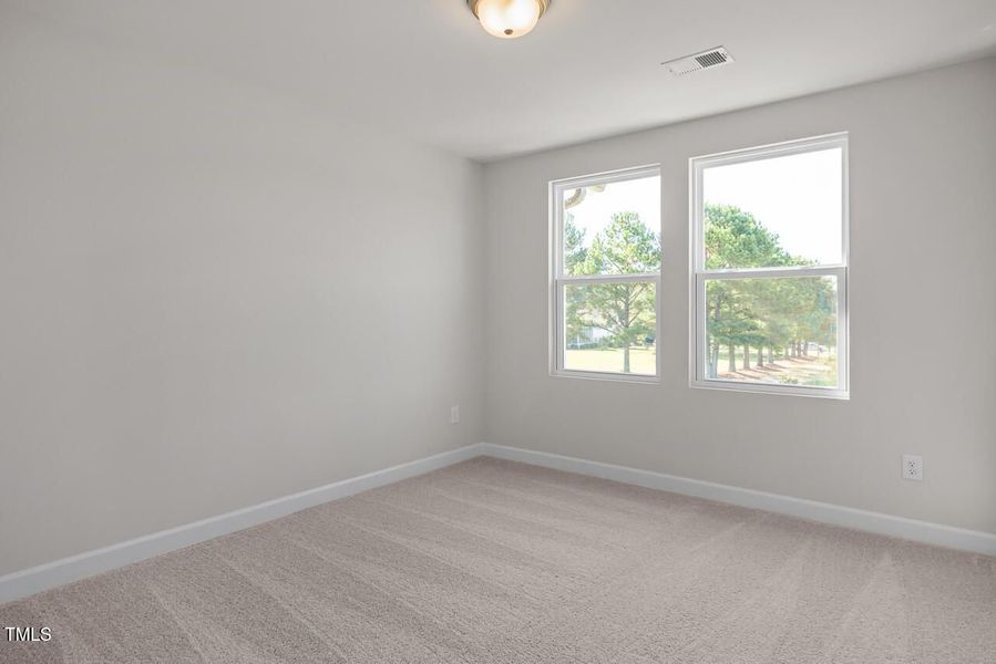 Spacious, unfurnished interior of a new home in Springvale, Fuquay Varina (Image 25).