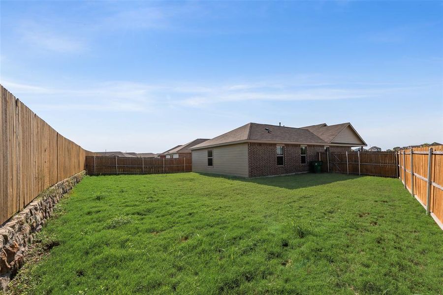 Front exterior of a new home in , Forney, TX, highlighting curb appeal (Image 13). Front exterior of a new home in , Forney, TX, highlighting curb appeal (Image 13).