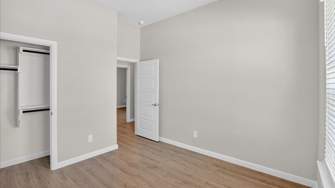 Representative unfurnished interior of a home built from the Odessa by D.R. Horton in Lakeview Pointe, Midlothian (Image 29).