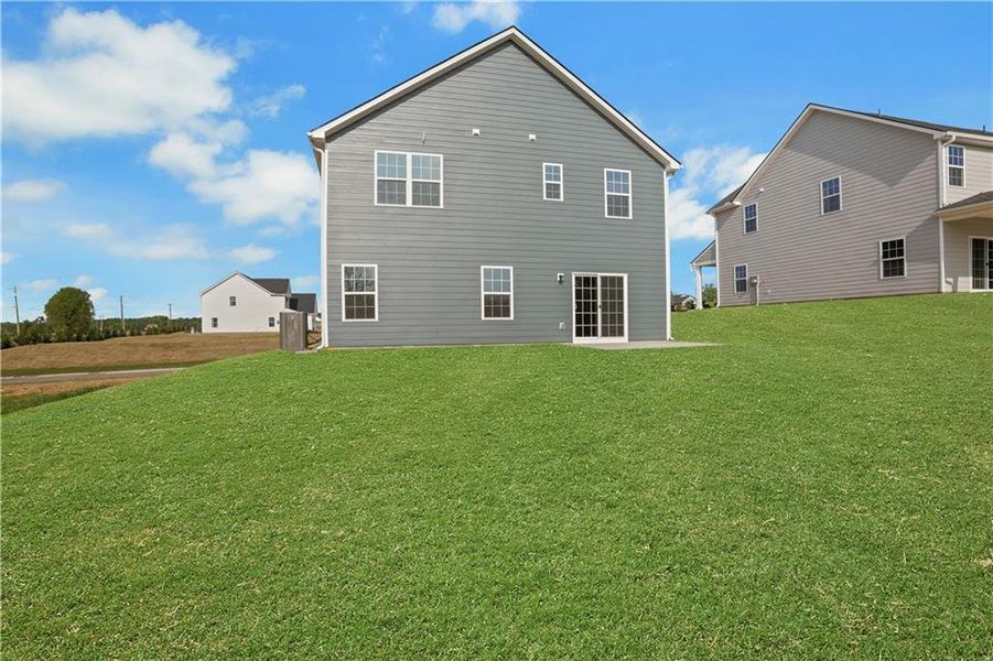 Exterior details and patio area of a home in Heritage Grove Ranch, Calhoun (Image 2).