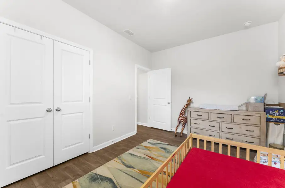Furnished interior view inside a new home in Pine Hills at Cane Bay, Summerville (Image 12).