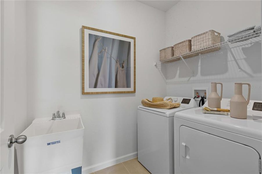 Furnished interior view inside a new home in Brystol North at Wylder, Port St. Lucie (Image 2).