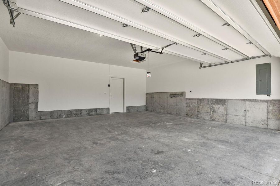 2-car attached garage includes 220v service for electric car charging 2-car attached garage includes 220v service for electric car charging