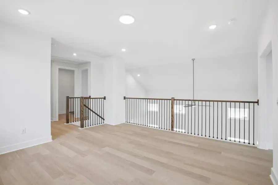Spacious, unfurnished interior of a new home in Saddle Ridge at Wildhorse Ranch, Manor (Image 19).
