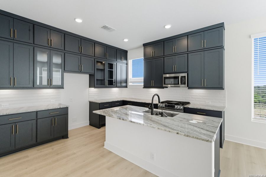 Furnished interior view inside a new home in Centero at Stone Oak, San Antonio (Image 10).
