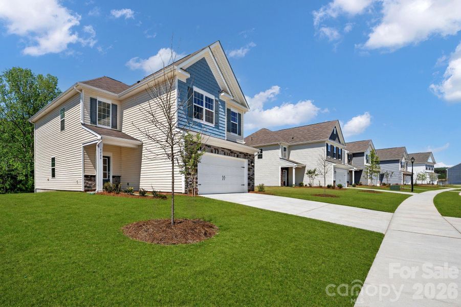 Front exterior of a new home in Shannon Woods, Maiden, NC, highlighting curb appeal (Image 2).