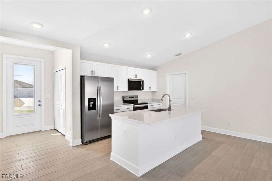 Furnished interior view inside a new home in Cape Coral, Cape Coral (Image 11). Furnished interior view inside a new home in Cape Coral, Cape Coral (Image 11).