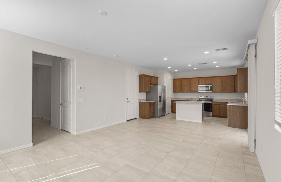Spacious, unfurnished interior of a new home in Asante- Atrium Series, Surprise (Image 24).