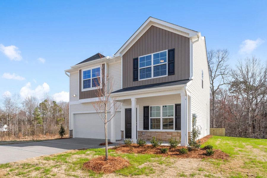 Front exterior of a new home in , Summerville, SC, highlighting curb appeal (Image 1). Front exterior of a new home in , Summerville, SC, highlighting curb appeal (Image 1).