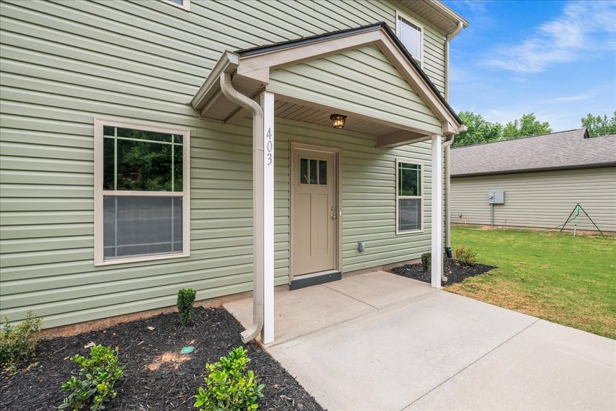 Representative exterior photo of a completed home built from the Branson by Enchanted Homes in Gentry Place, Spartanburg, SC (Image 16).