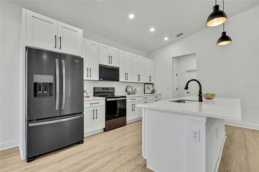 Furnished interior view inside a new home in , Weeki Wachee (Image 13).