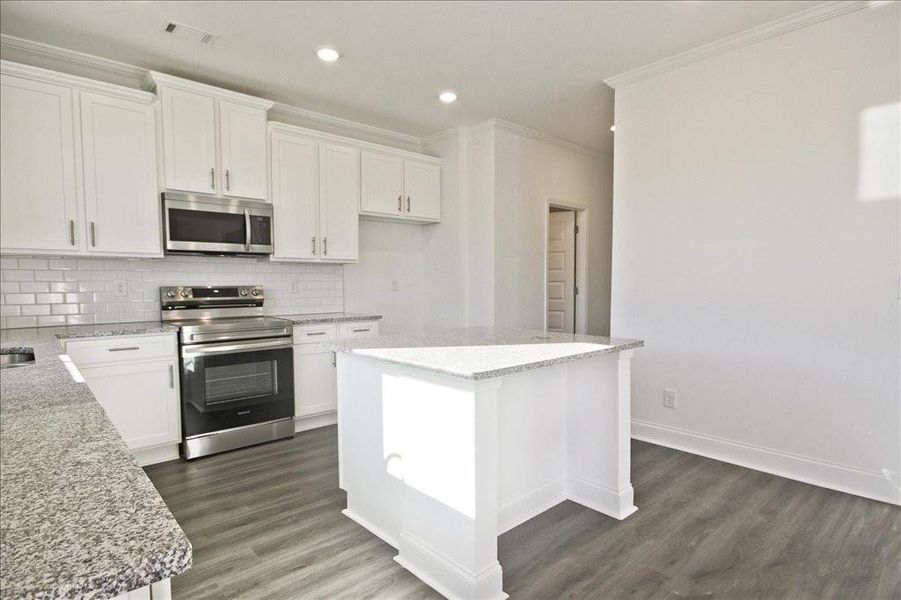 Furnished interior view inside a new home in Clark Farms, Flowery Branch (Image 6). Furnished interior view inside a new home in Clark Farms, Flowery Branch (Image 6).