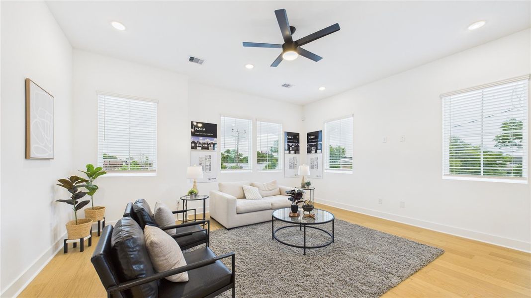 This stunning open-concept living area on the second floor offers a perfect blend of style and functionality, ideal for modern living. Expansive windows flood the space with natural light, enhancing the airy ambiance and highlighting the thoughtfully designed layout. This stunning open-concept living area on the second floor offers a perfect blend of style and functionality, ideal for modern living. Expansive windows flood the space with natural light, enhancing the airy ambiance and highlighting the thoughtfully designed layout.