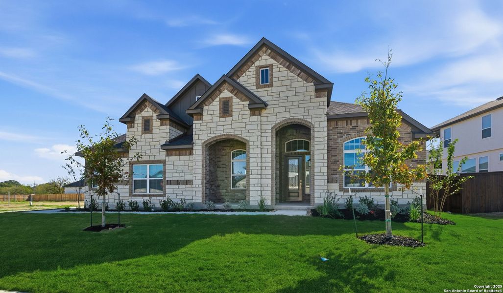 Front exterior of a new home in Mesa Western, Cibolo, TX, highlighting curb appeal (Image 22).