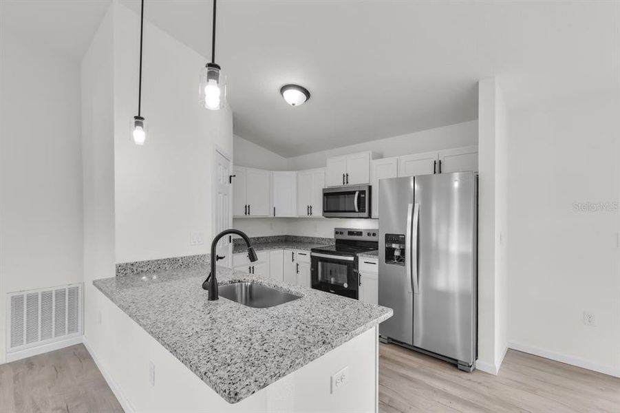 Furnished interior view inside a new home in , Ocala (Image 7).