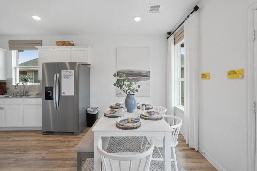Every corner of this dining area feels like it was made for memories—celebrating birthdays, hosting holiday feasts, or simply enjoying a quiet cup of coffee in the morning sun.