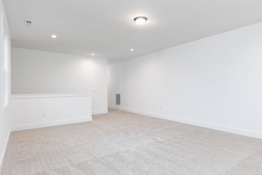 Spacious, unfurnished interior of a new home in High Grove Oaks, Fuquay Varina (Image 52).