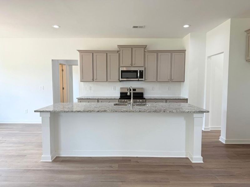 Furnished interior view inside a new home in Westlyn, Winder (Image 7).