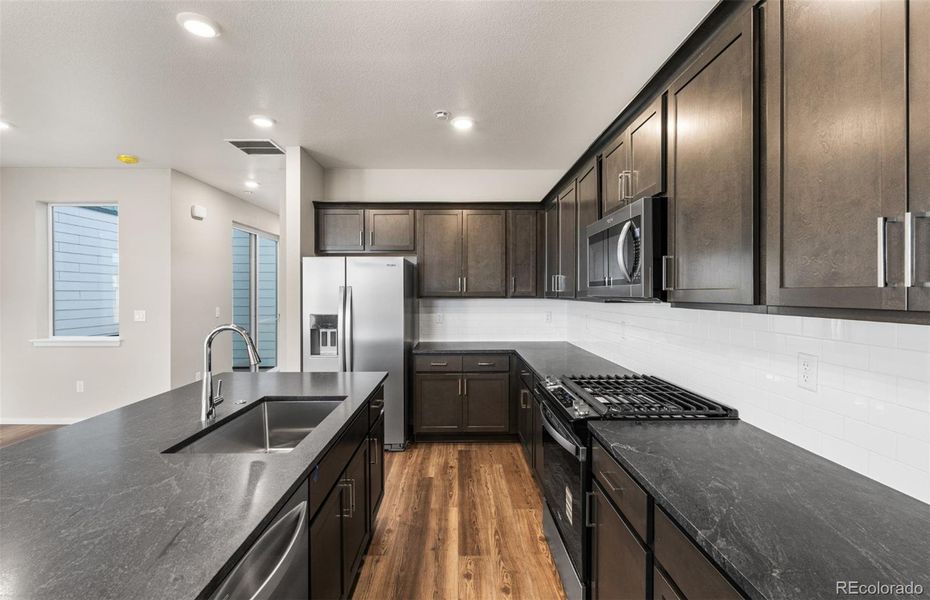 Furnished interior view inside a new home in Painted Prairie, Aurora (Image 6).