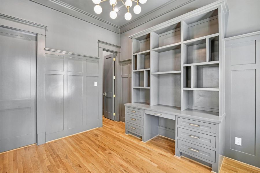 There is a large closet in the study as well as a pocket door to the powder bath. There is a large closet in the study as well as a pocket door to the powder bath.