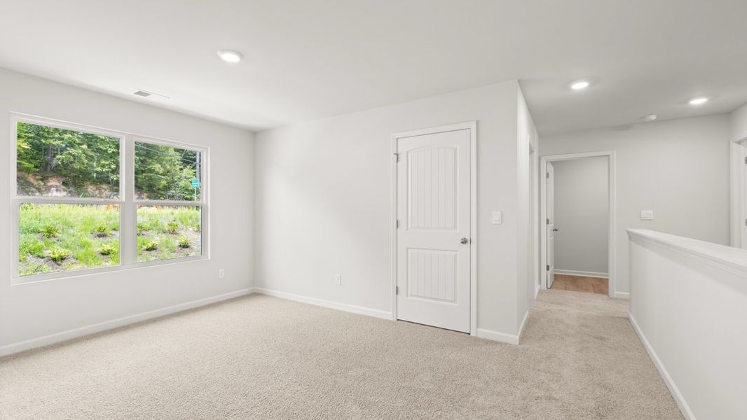 Representative unfurnished interior of a home built from the Hayden by D.R. Horton in Northwoods at Mirror Lake, Villa Rica (Image 29).