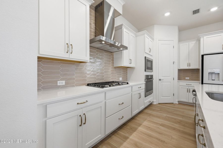 Furnished interior view inside a new home in Crosswinds 40’, Ponte Vedra (Image 12).