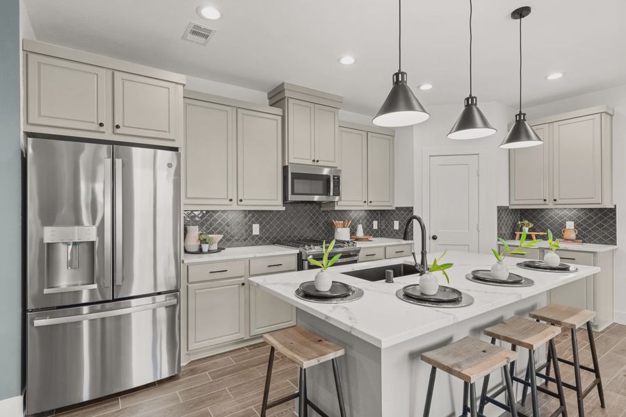 Representative furnished interior of a home built from the Countryside by Chesmar Homes in Meridiana Townhomes, Iowa Colony (Image 6).
