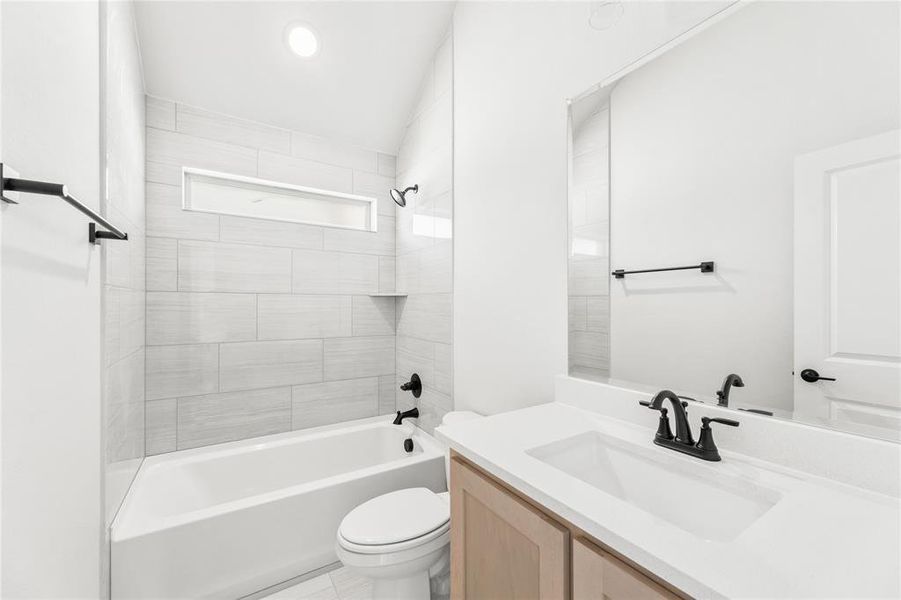 Furnished interior view inside a new home in Painted Tree Woodland District 50, McKinney (Image 9).