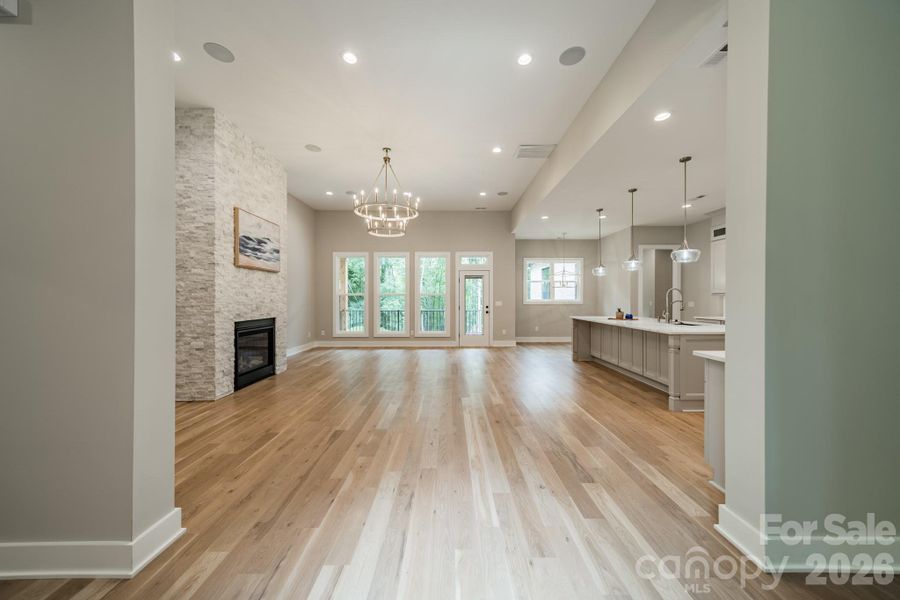 Gorgeous Open Concept Living overlooking Lake Norman with 12 foot ceilings and a stunning stacked stone fireplace